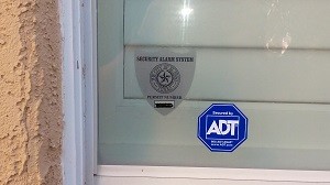 ADT decal at window